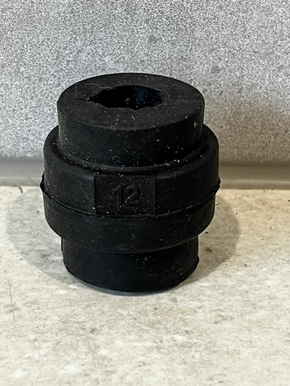 Bag of bulk black rubber grommets labeled 12mm