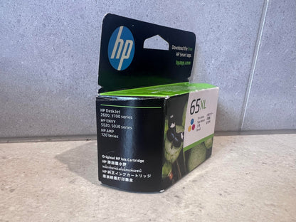 Angled side view of HP 65XL Tri-Color Ink Cartridge box