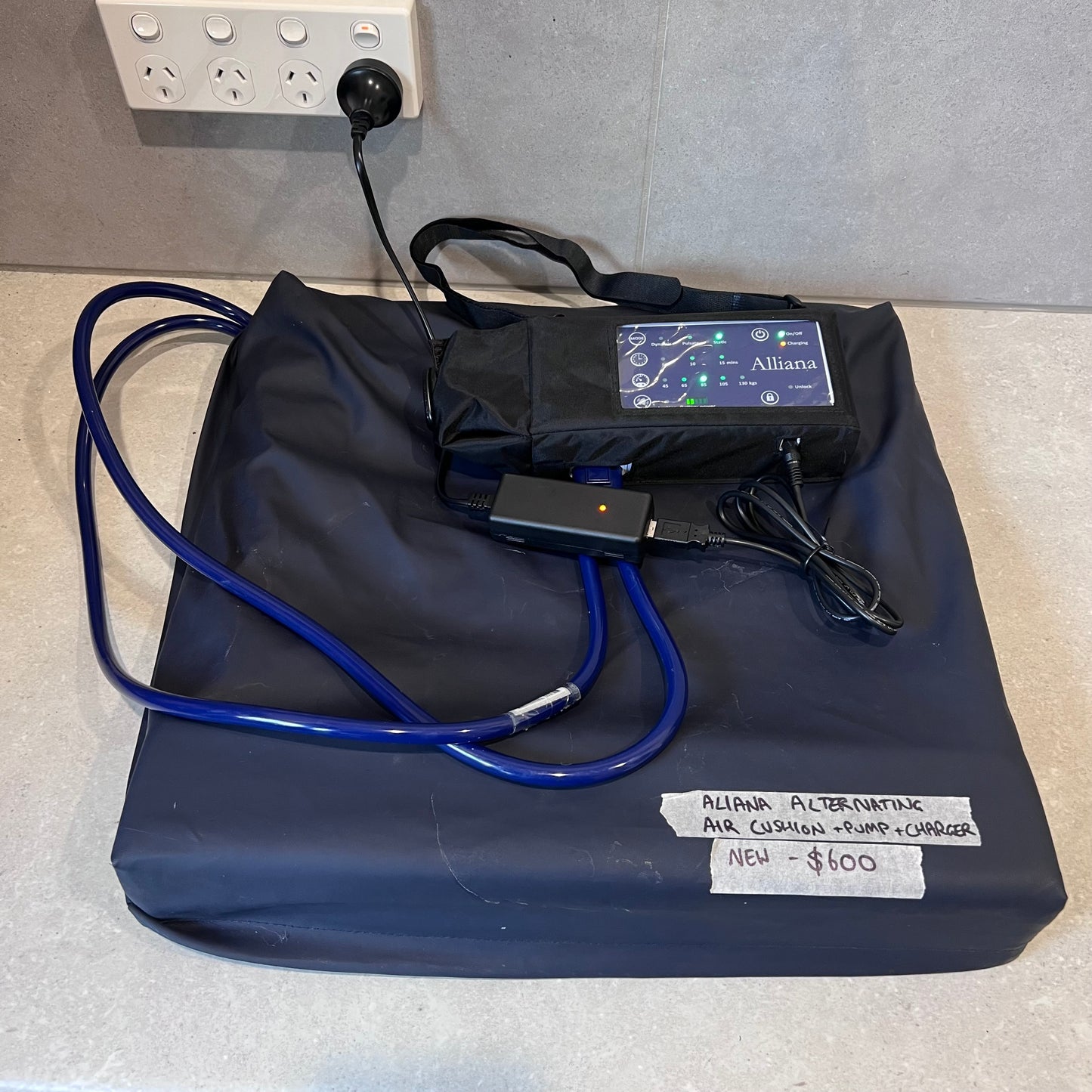Alliana air seat cushion with pump and charger connected