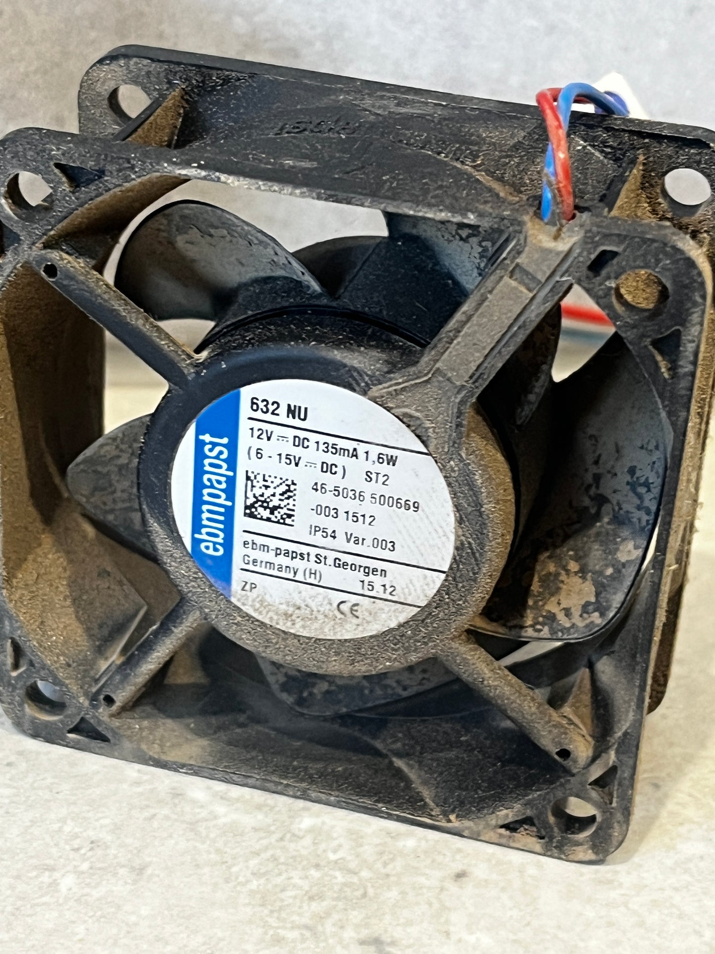 Close-up of ebm-papst 632 NU 12V DC axial fan label and wiring