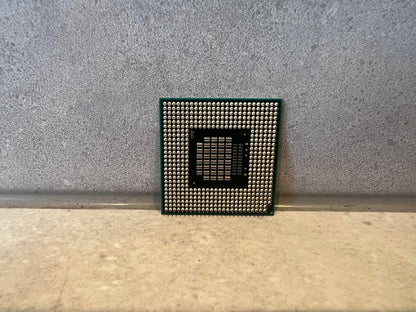 Back view showing pins of Intel SL8YP laptop processor chip