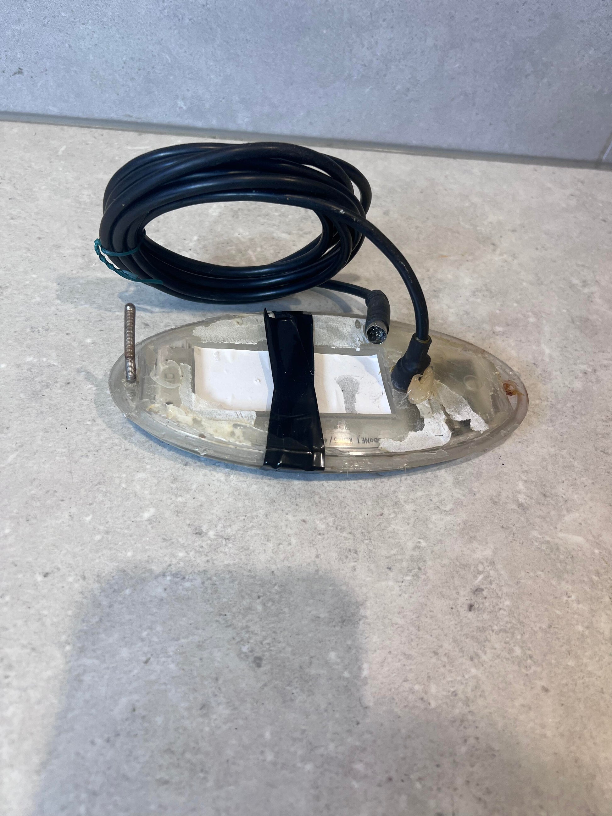 Back view of Heritage Spas digital spa control panel showing attached cable and mounting area