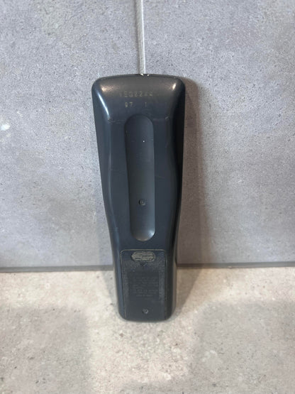 Back view of universal remote control showing battery compartment