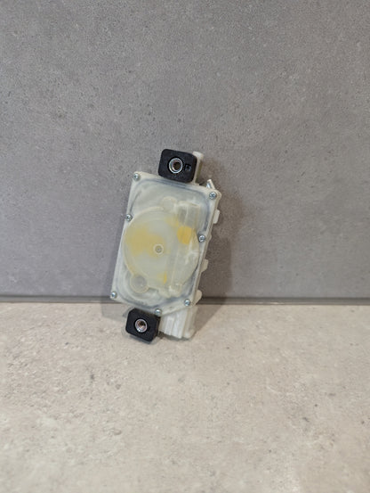 Rear view of Mitsuba door lock actuator showing gear mechanism