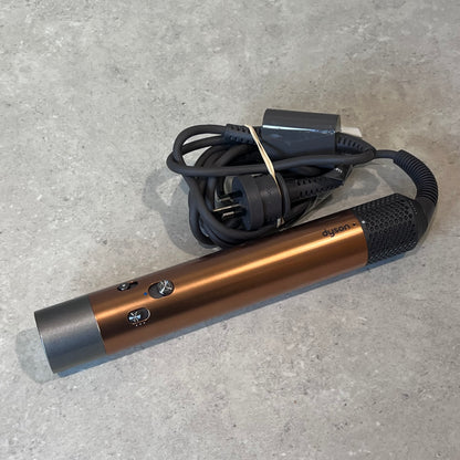 Dyson Airwrap main unit with attached power cord close-up