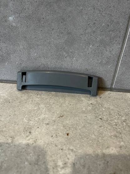 Back view of gray plastic replacement drawer handle showing attachment slots