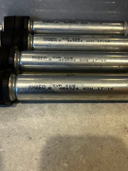 Close-up view of Gorenje SUSPA TYP 008 product markings on shock absorbers