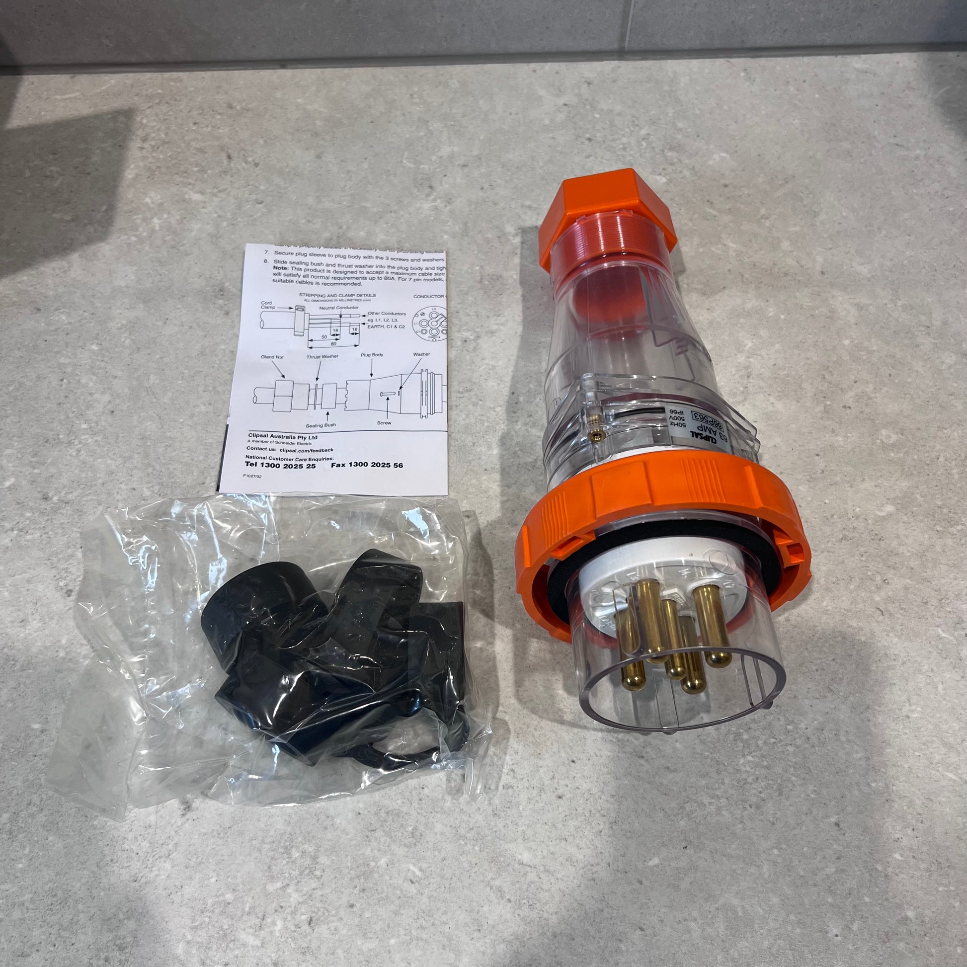 Clipsal 5 pin 63A industrial plug with installation manual and accessories