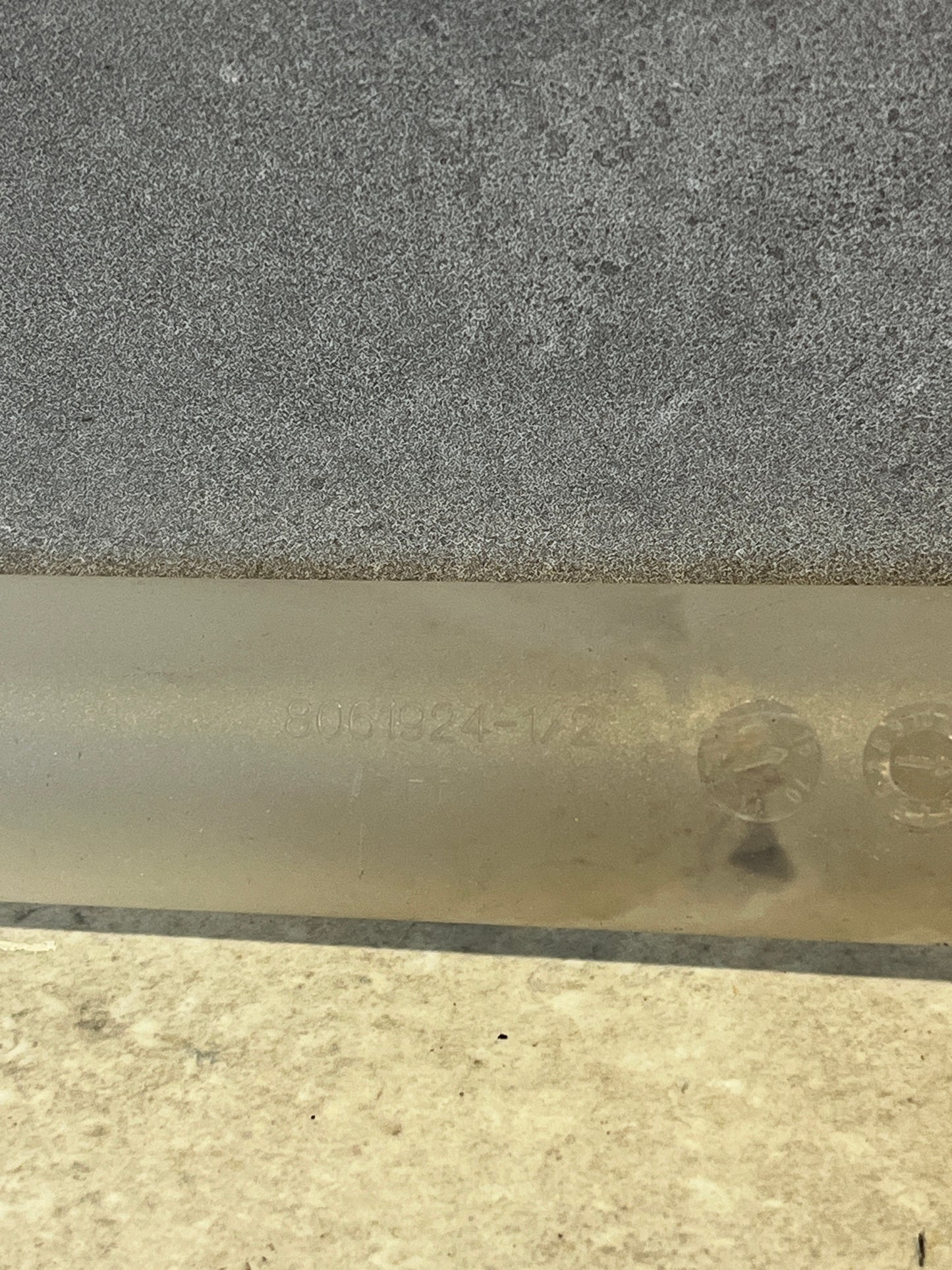 Close-up of marking on translucent plastic syringe tube