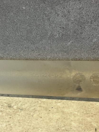 Close-up of marking on translucent plastic syringe tube