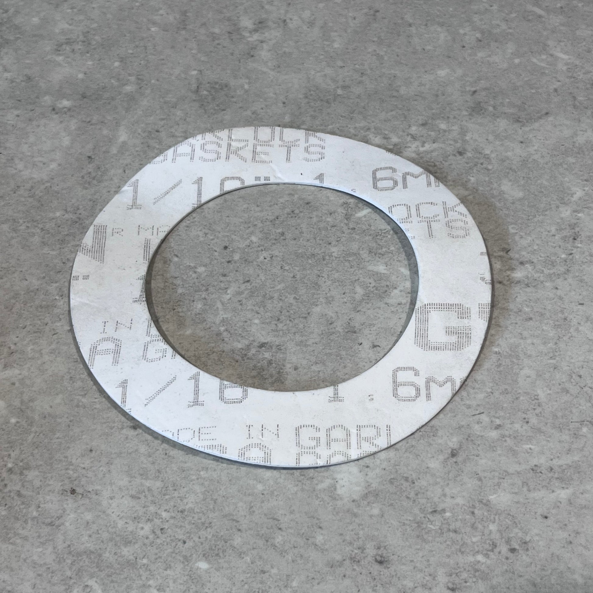 Garlock PTFE gasket with printed specifications visible