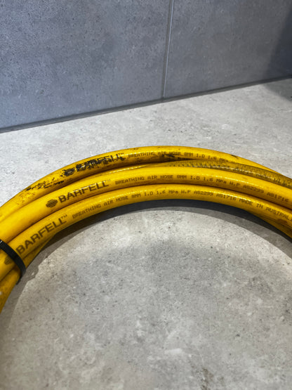 Detailed view of Barfell branding and specifications printed on yellow hose