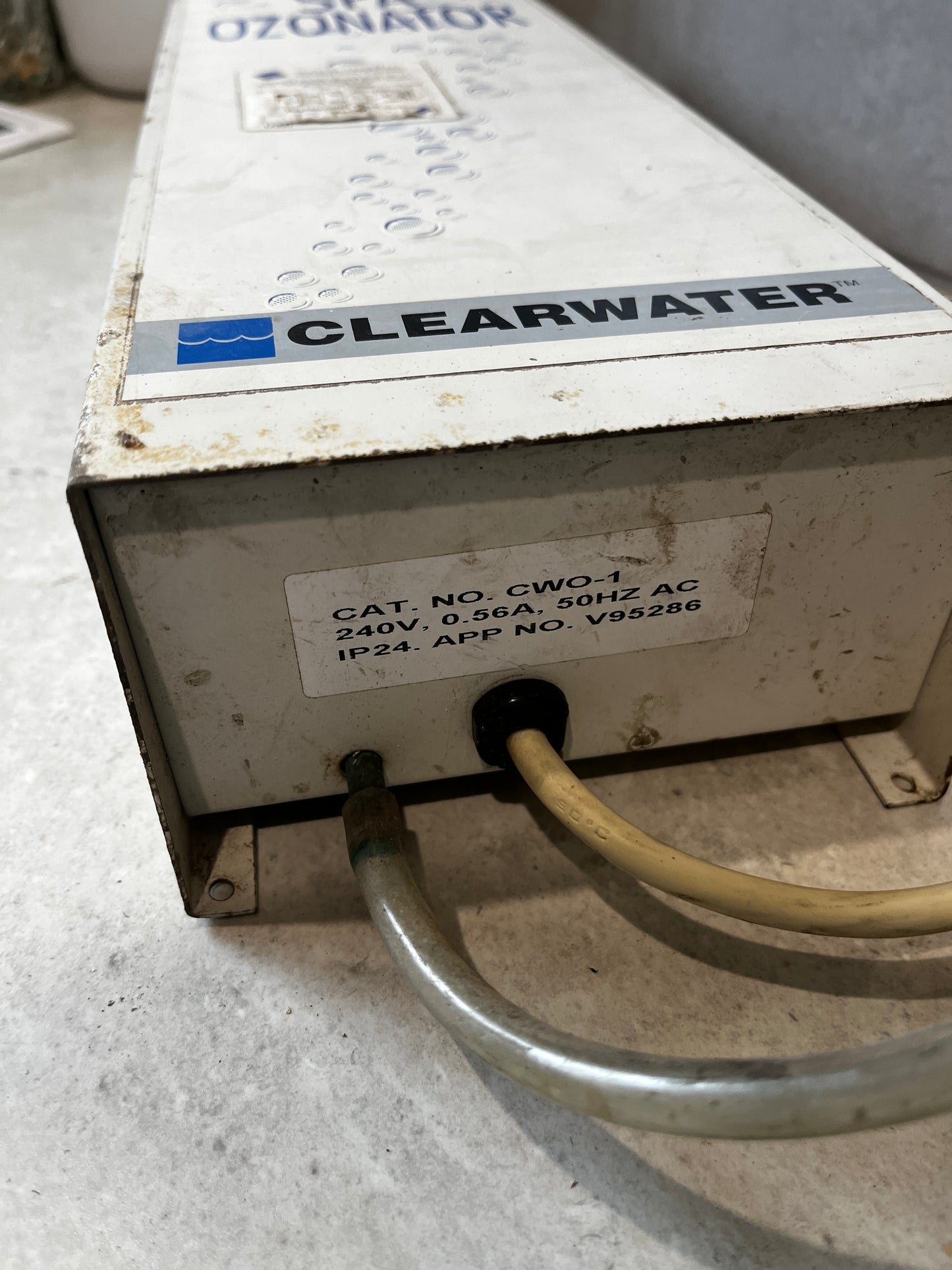Clearwater spa ozonator showing cable and hose connections