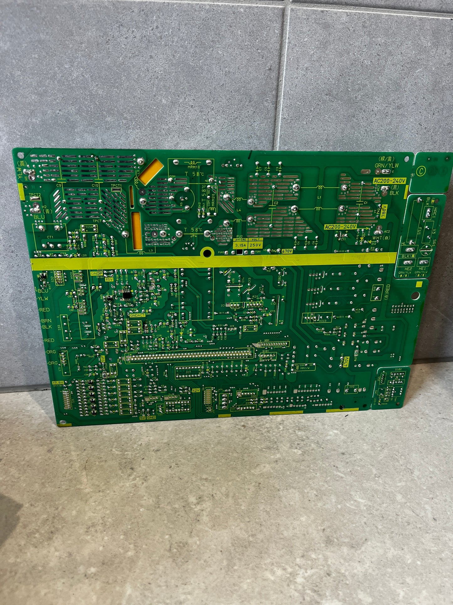 Back view of printed circuit board showing connections and traces