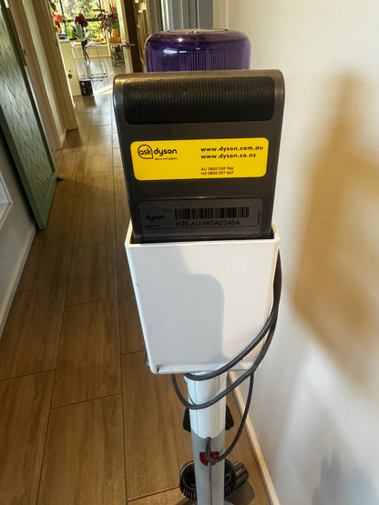 Top view of Dyson vacuum battery pack showing model and contact details