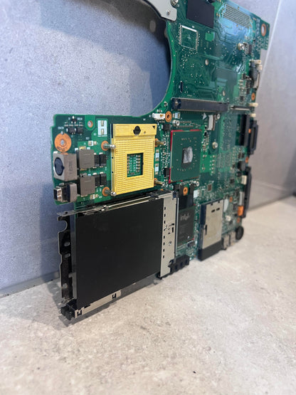 Angled view highlighting RAM and processor sockets