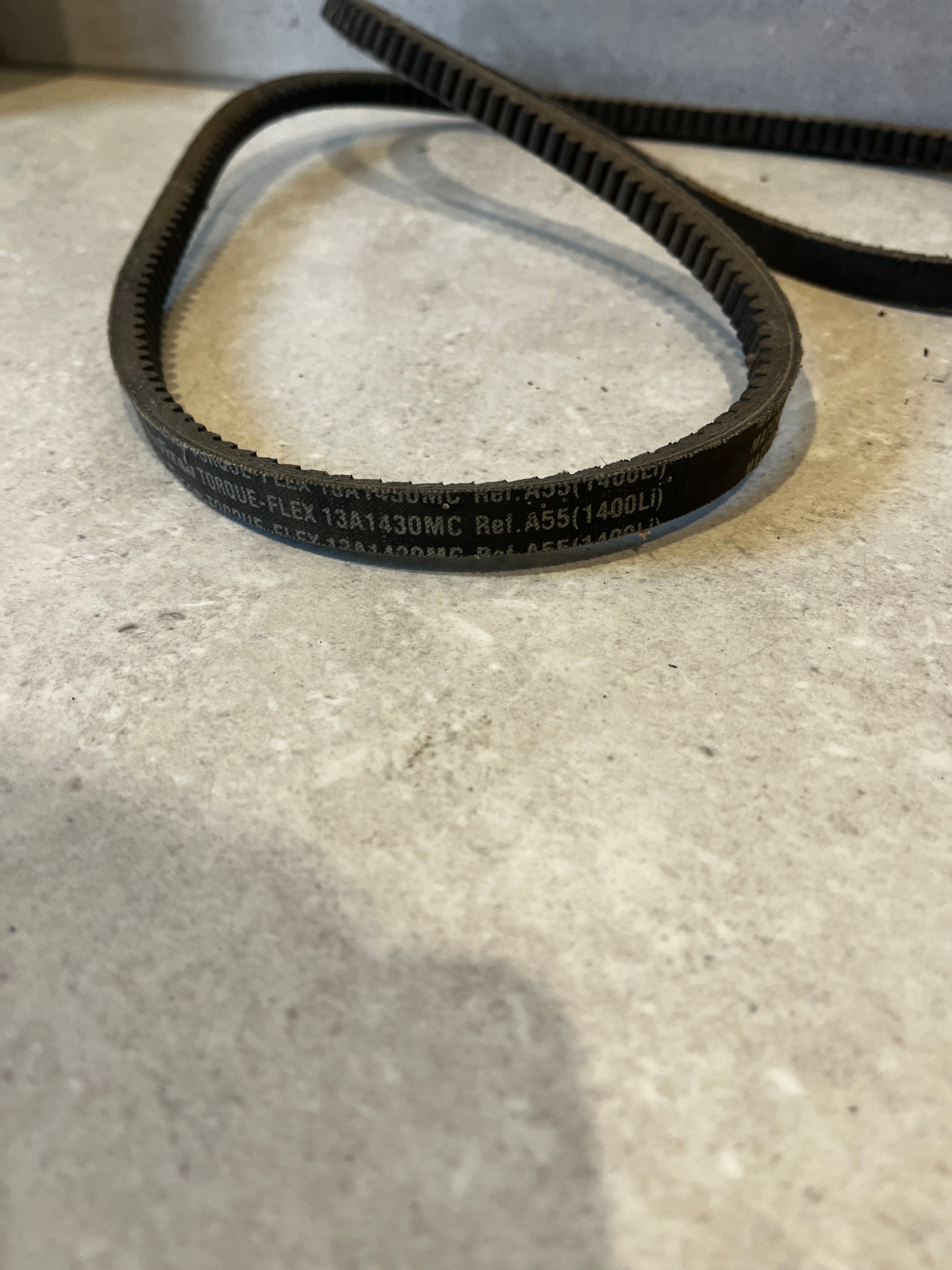 Detail of Goodyear Torque-Flex V-belt showing printed specifications