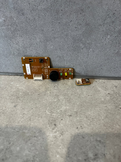 Daikin circuit board assembly with additional small board on gray background