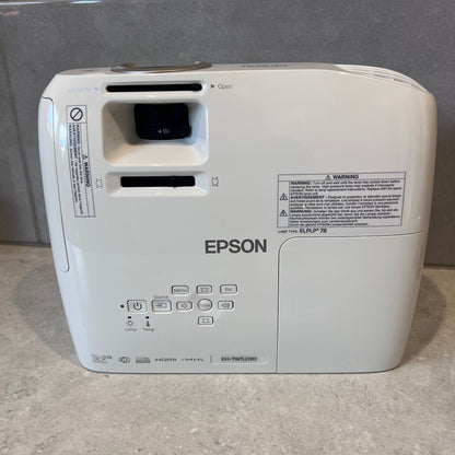 Top view of Epson EH-TW5200 projector showing lens and control buttons