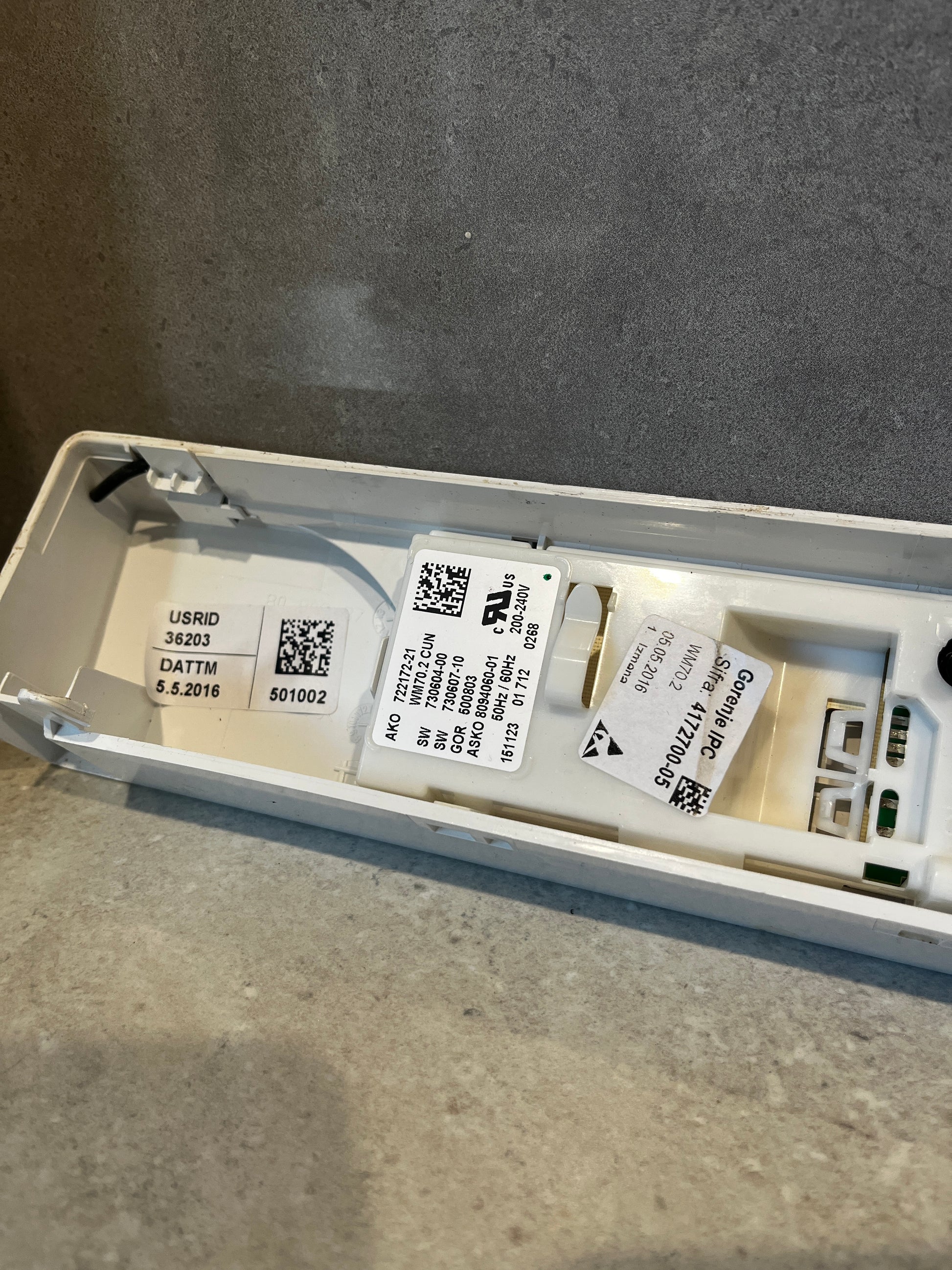 ASKO washing machine control panel internal label close-up