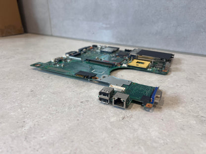 Low-angle view of motherboard ports including USB and VGA