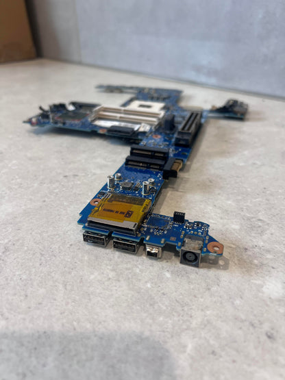 Angled view showing USB, network, and power ports on mainboard