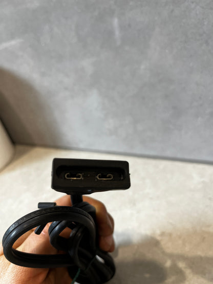 View of two metal prongs inside the power cord connector