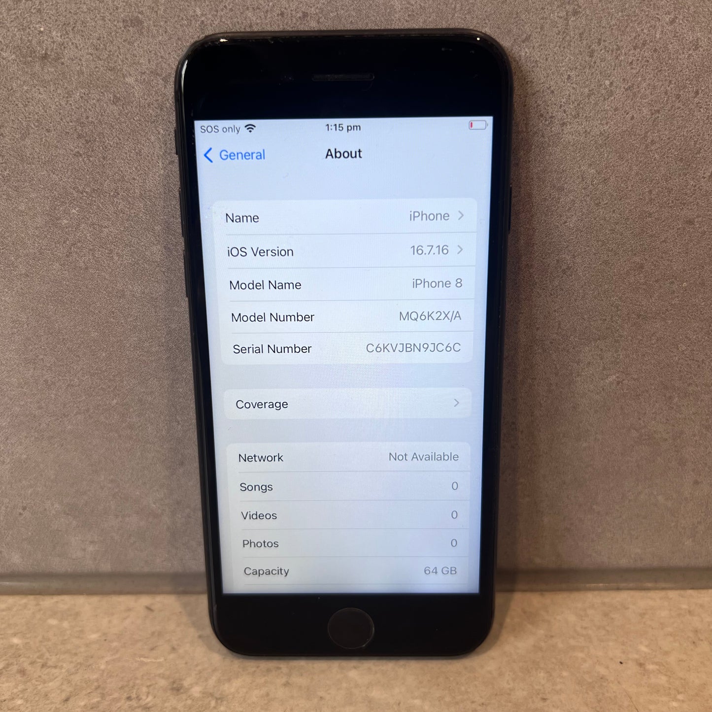 Front screen showing iPhone 8 system information with model details