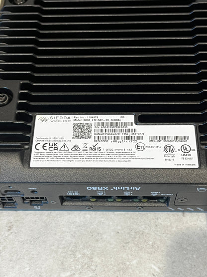 Close-up of router label showing regulatory and technical information