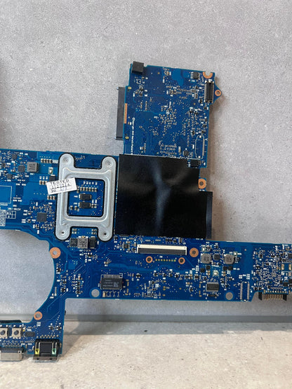 Close-up of rear board circuitry and components on laptop mainboard